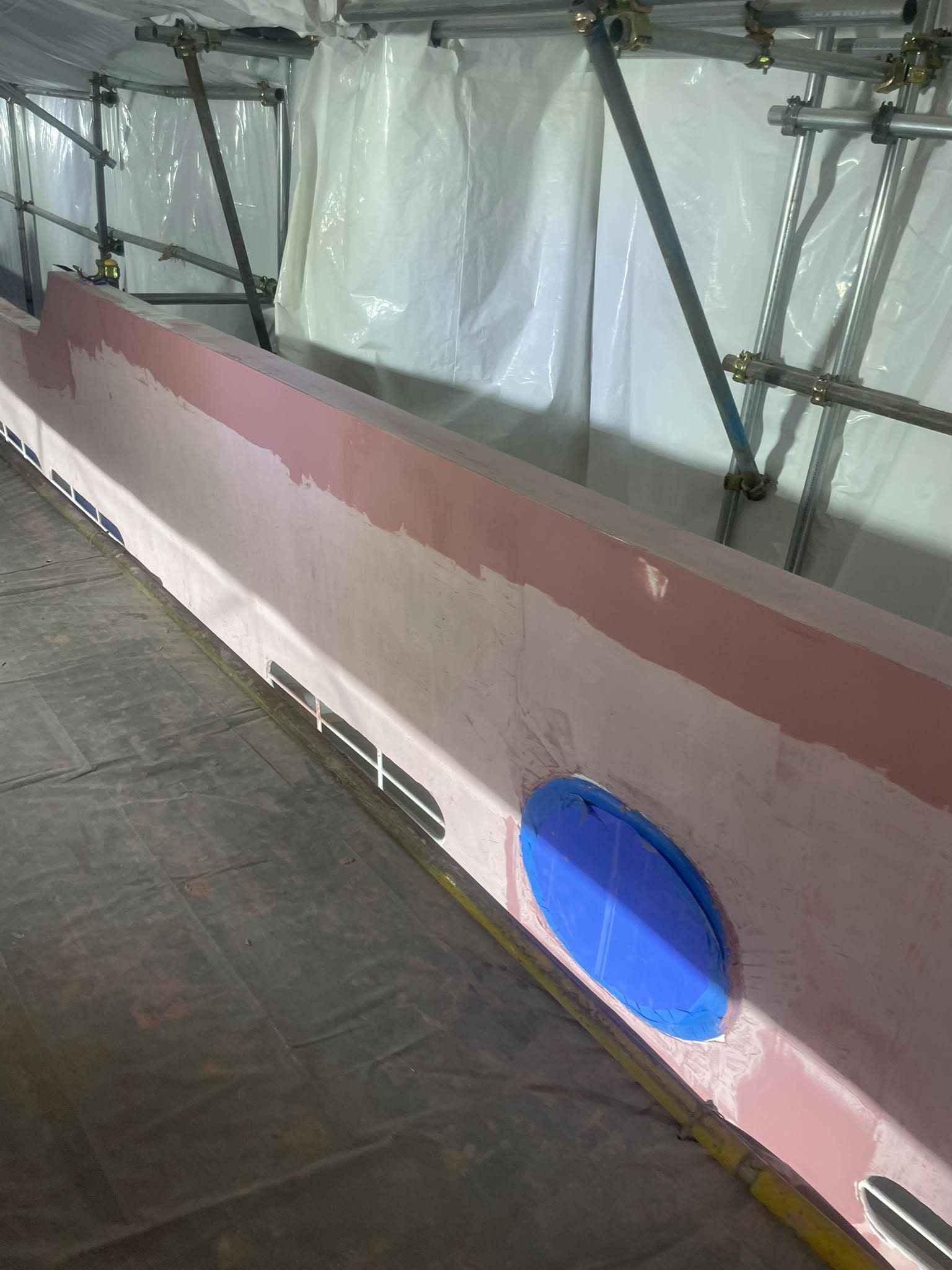 Fairing in progress on a 76 m superyacht hull, Singapore